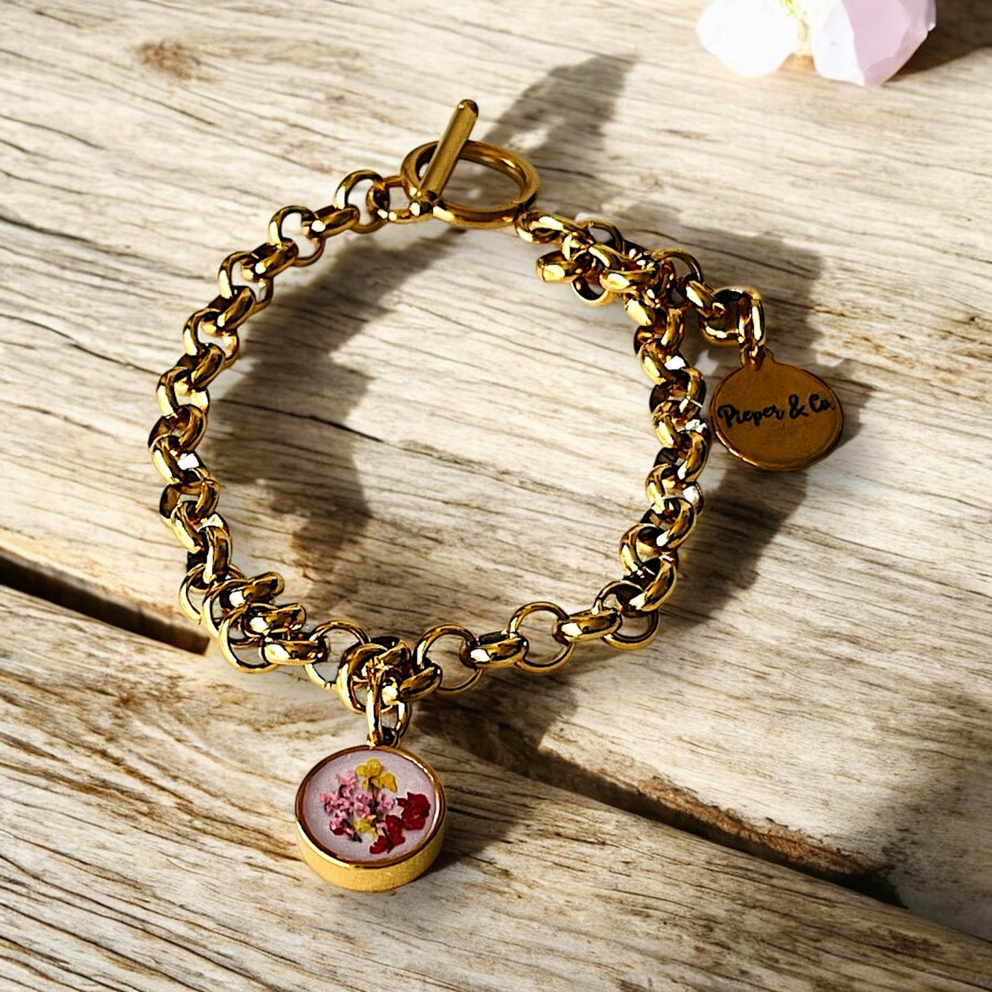 Gold plated Stainless Steel bracelet with floral charm