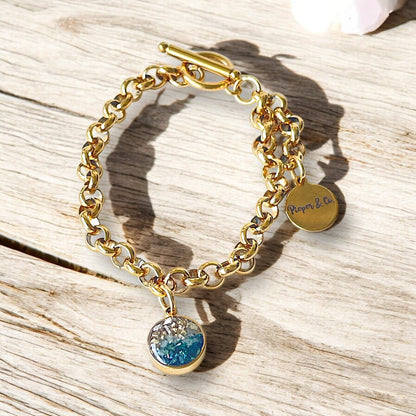 Gold plated Stainless Steel bracelet with Green and Gold color charm