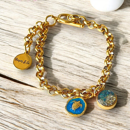 Gold plated Stainless Steel bracelet with turtle and Green and Gold color charms