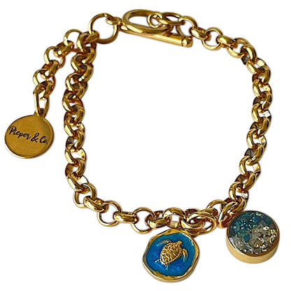 Gold plated Stainless Steel bracelet with turtle and Green and Gold color charms