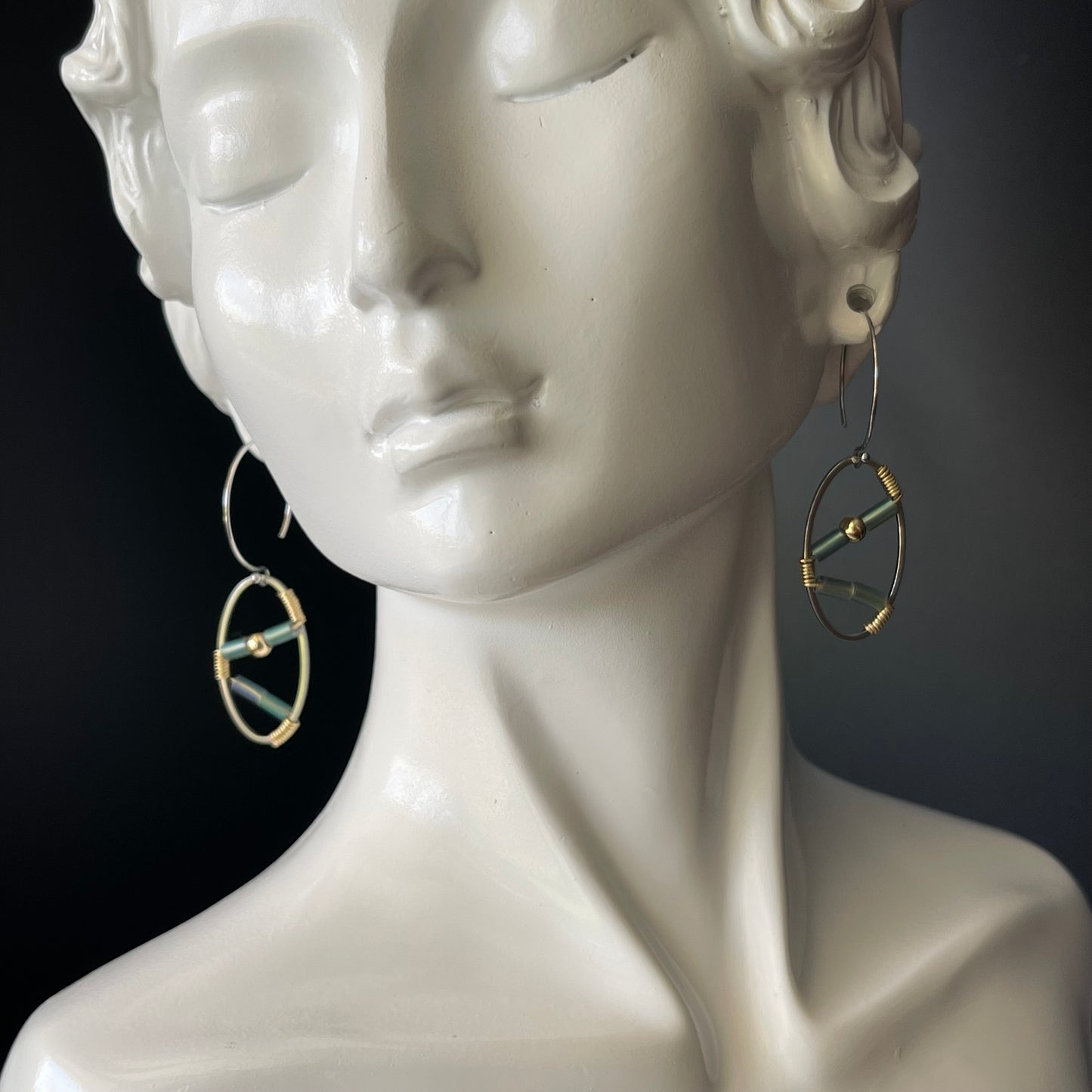 Dangle Oval Shape Earrings in Brass Platinum Plated Color